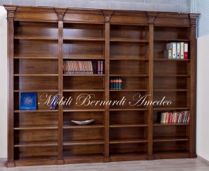 Libreria in stile classico da studio o biblioteca realizzata in legno massello con capitelli intagliati